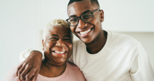Teen with mom smiling showing the power of open communication with parents.