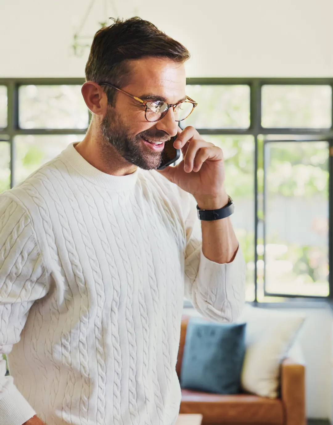 Man on a phone call scheduling a confidential alcohol detox screening